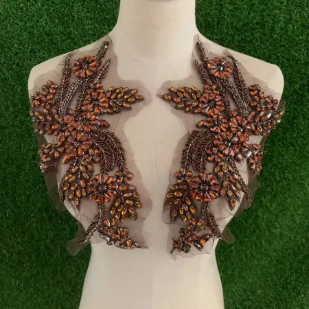 Crystal dress corset with water diamonds and wheat ear decals on the top Crystal dress corset with water diamonds and wheat ear decals on the top
